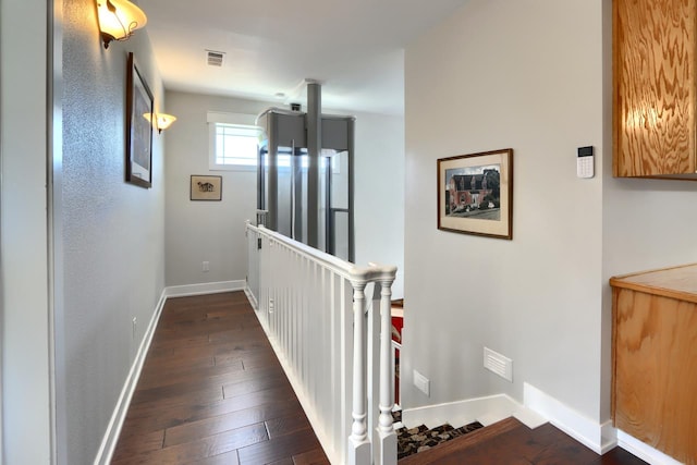 43295 Running Deer Dr, Coarsegold, CA 93614 - corridor with an upstairs landing and dark wood-type flooring