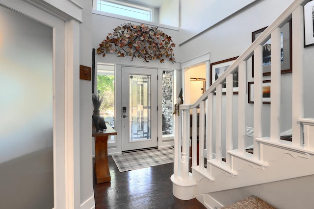 43295 Running Deer Dr, Coarsegold, CA 93614 - foyer entrance featuring healthy amount of natural light, stairway, wood finished floors, and a towering ceiling
