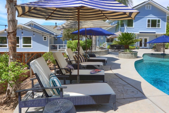 43295 Running Deer Dr, Coarsegold, CA 93614 - rear view of house with french doors, a patio, and an outdoor pool