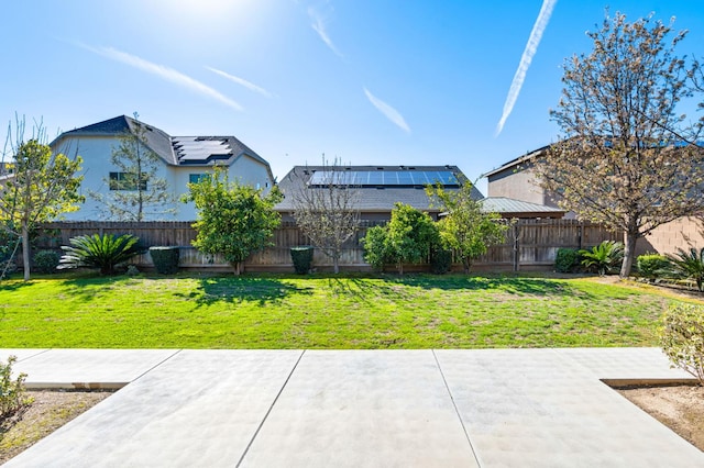7399 N Riverside Dr, Fresno, CA 93722 - fenced backyard with a patio