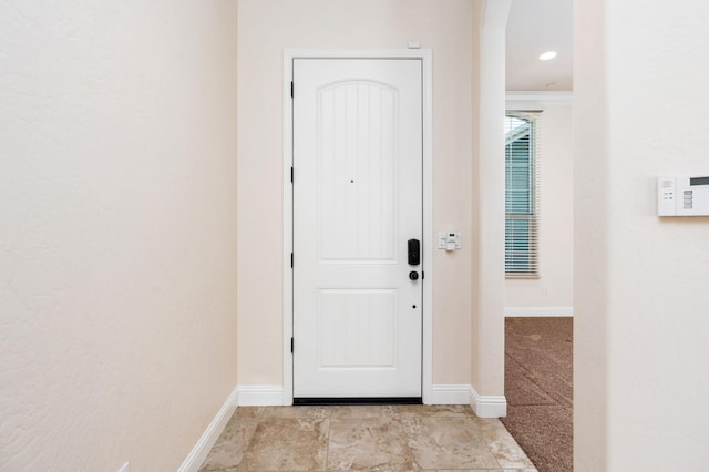7399 N Riverside Dr, Fresno, CA 93722 - doorway featuring baseboards and arched walkways