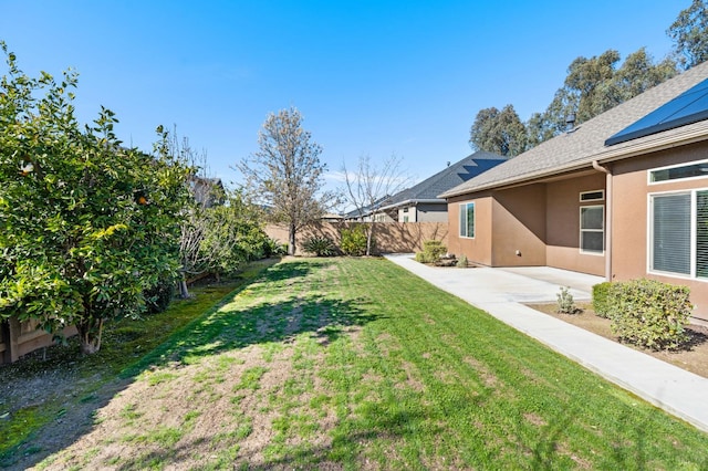 7399 N Riverside Dr, Fresno, CA 93722 - fenced backyard featuring a patio area