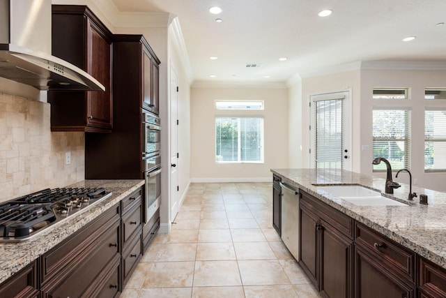 7399 N Riverside Dr, Fresno, CA 93722 - kitchen featuring wall chimney exhaust hood, stainless steel appliances, tasteful backsplash, light stone counters, and light tile patterned floors