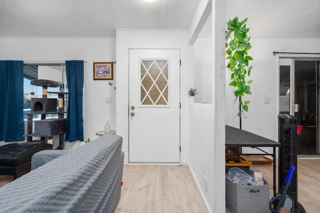 2575 S Willow Ave Unit 229, Fresno, CA 93725 - foyer entrance featuring light wood-style floors