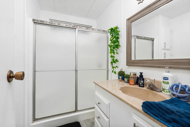 2575 S Willow Ave Unit 229, Fresno, CA 93725 - bathroom with vanity and a shower stall