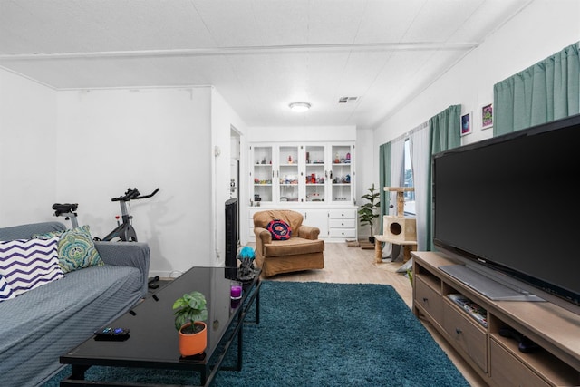 2575 S Willow Ave Unit 229, Fresno, CA 93725 - living room featuring wood finished floors