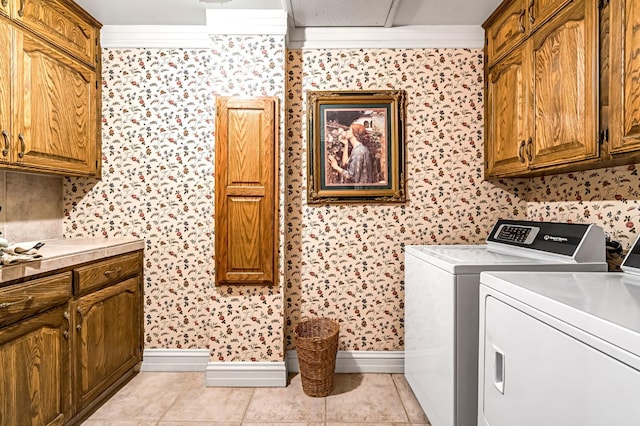 1917 Evergreen Pl, Madera, CA 93637 - laundry room with wallpapered walls, separate washer and dryer, cabinet space, crown molding, and light tile patterned floors
