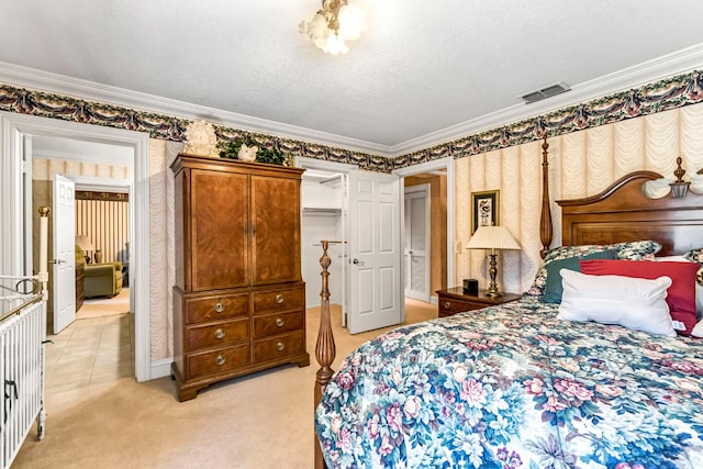 1917 Evergreen Pl, Madera, CA 93637 - bedroom with ornamental molding, light colored carpet, wallpapered walls, and a spacious closet