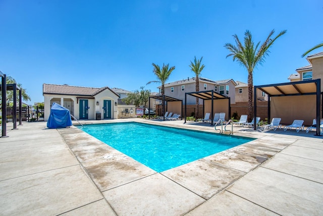212 Arbor Dr S, Madera, CA 93636 - community pool with a patio, a gazebo, and a residential view