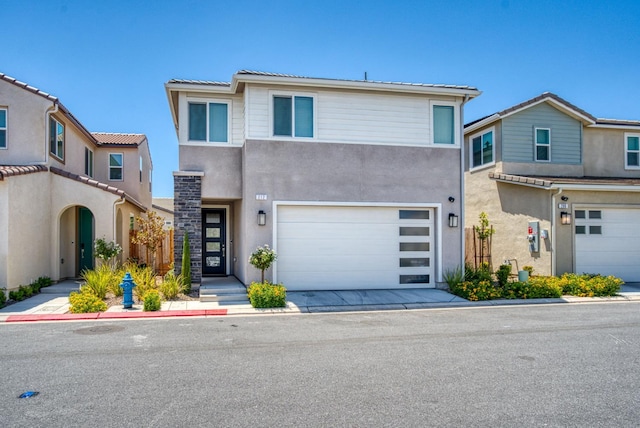 212 Arbor Dr S, Madera, CA 93636 - multi unit property featuring an attached garage, stucco siding, and concrete driveway