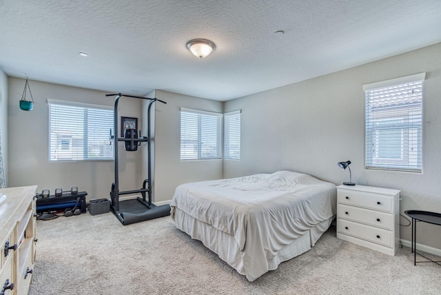 212 Arbor Dr S, Madera, CA 93636 - bedroom featuring light carpet and a textured ceiling