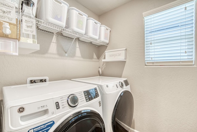 212 Arbor Dr S, Madera, CA 93636 - washroom with independent washer and dryer, healthy amount of natural light, and a textured wall