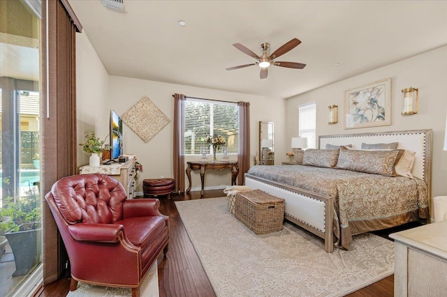 3982 Flint Ave, Clovis, CA 93619 - bedroom with wood finished floors and a ceiling fan