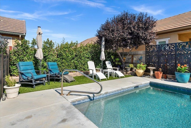 3982 Flint Ave, Clovis, CA 93619 - view of swimming pool featuring a fenced backyard and a patio area
