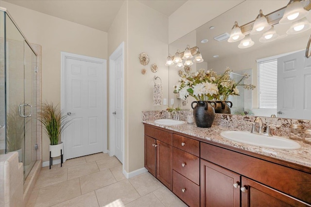 3982 Flint Ave, Clovis, CA 93619 - full bath featuring double vanity, a stall shower, and tile patterned floors