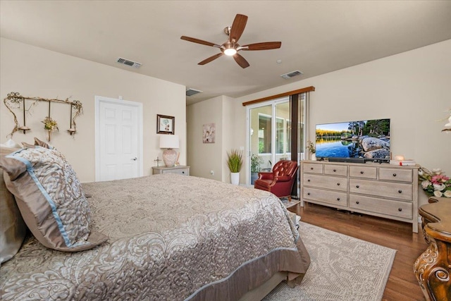3982 Flint Ave, Clovis, CA 93619 - bedroom featuring wood finished floors, access to outside, and ceiling fan