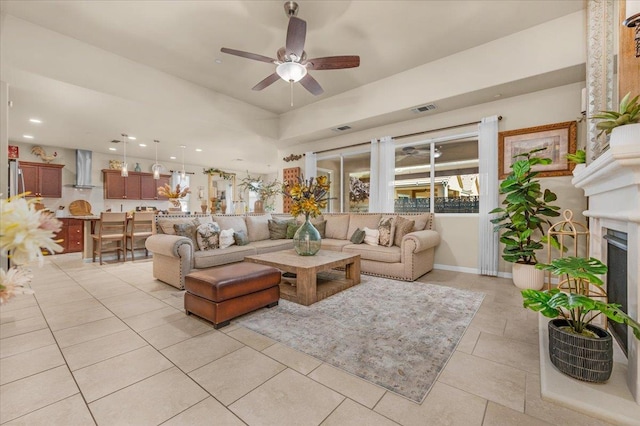 3982 Flint Ave, Clovis, CA 93619 - living area featuring light tile patterned floors, ceiling fan, recessed lighting, and a fireplace