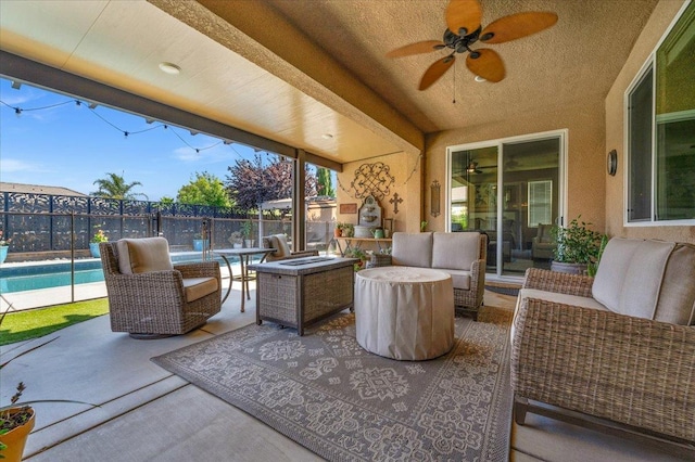 3982 Flint Ave, Clovis, CA 93619 - fenced backyard featuring outdoor lounge area, a patio, and ceiling fan