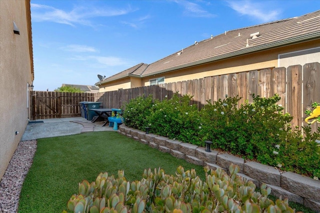 3982 Flint Ave, Clovis, CA 93619 - fenced backyard featuring a patio area
