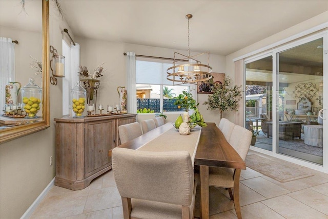 3982 Flint Ave, Clovis, CA 93619 - dining space with a chandelier and light tile patterned floors