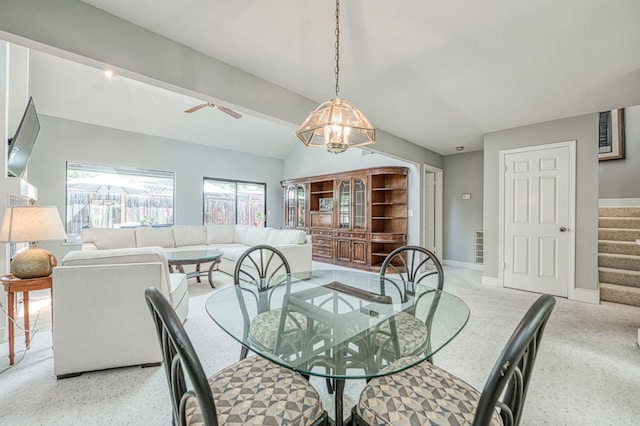 7047 N Teilman Ave Unit 102, Fresno, CA 93711 - dining area with stairs, a chandelier, speckle patterned floor, and ceiling fan