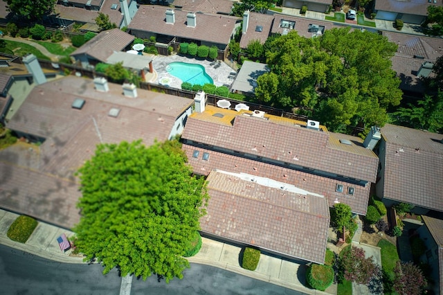 7047 N Teilman Ave Unit 102, Fresno, CA 93711 - aerial view of property and surrounding area with a pool area and nearby suburban area