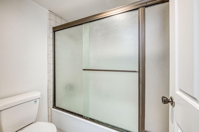 7047 N Teilman Ave Unit 102, Fresno, CA 93711 - full bathroom featuring toilet and combined bath / shower with glass door