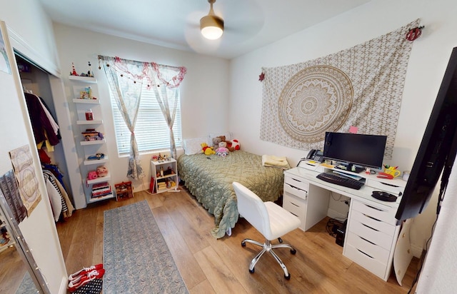 4367 Salem Ln, Clovis, CA 93619 - bedroom featuring light wood finished floors, an office area, and a ceiling fan