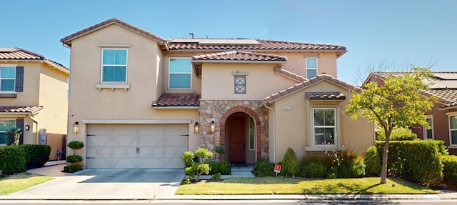 4367 Salem Ln, Clovis, CA 93619 - mediterranean / spanish house featuring a tiled roof, stucco siding, solar panels, driveway, and a garage