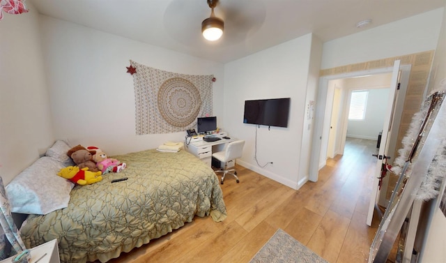 4367 Salem Ln, Clovis, CA 93619 - bedroom with light wood finished floors and a ceiling fan