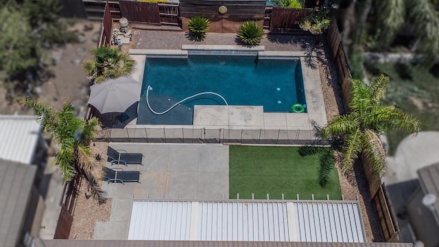 7230 E Dayton Ave, Fresno, CA 93737 - view of swimming pool with a fenced backyard