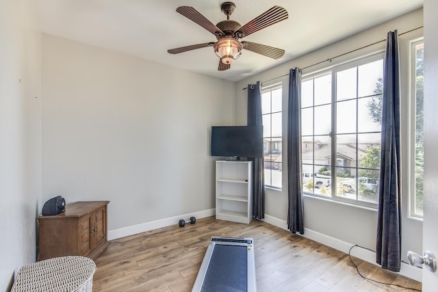 7230 E Dayton Ave, Fresno, CA 93737 - workout area featuring light wood-style floors and a ceiling fan
