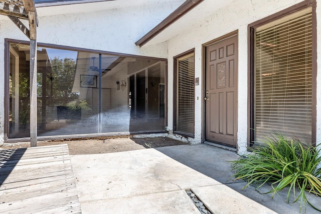 2076 W Calimyrna Ave Unit 102, Fresno, CA 93711 - property entrance with stucco siding