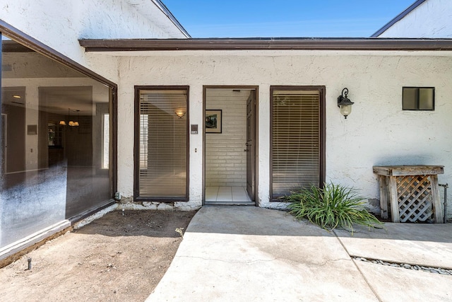 2076 W Calimyrna Ave Unit 102, Fresno, CA 93711 - property entrance featuring stucco siding