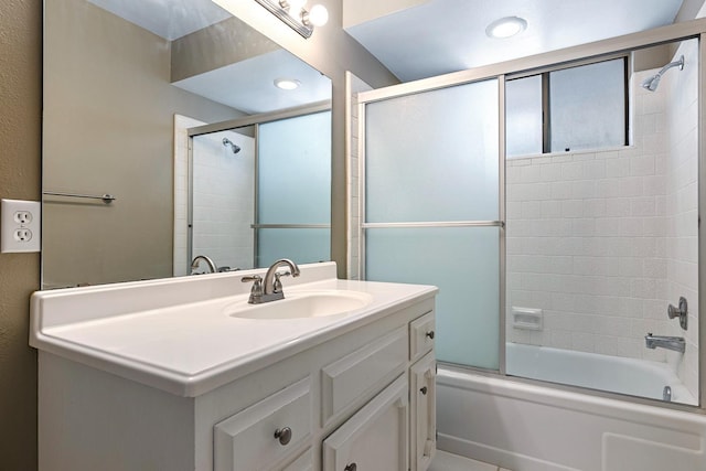 2076 W Calimyrna Ave Unit 102, Fresno, CA 93711 - bathroom featuring vanity and enclosed tub / shower combo