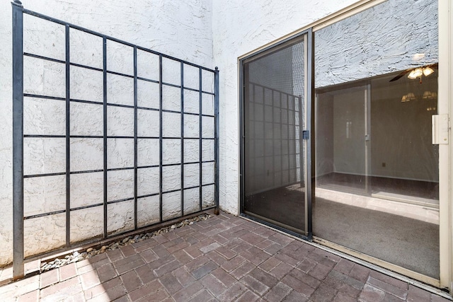 2076 W Calimyrna Ave Unit 102, Fresno, CA 93711 - unfurnished sunroom featuring ceiling fan