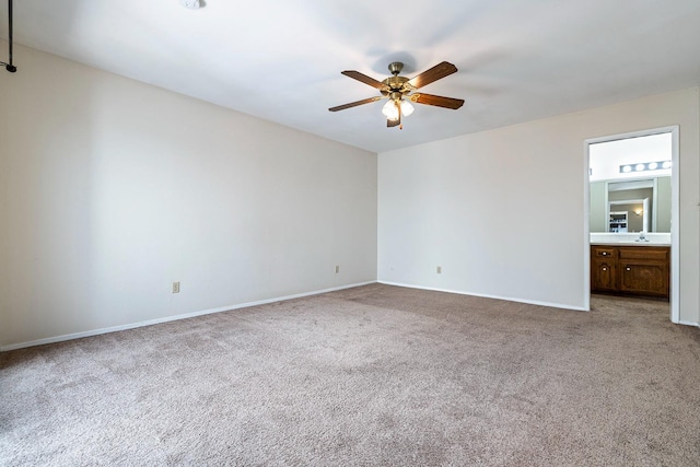 2076 W Calimyrna Ave Unit 102, Fresno, CA 93711 - unfurnished bedroom with carpet floors, ensuite bath, and a ceiling fan
