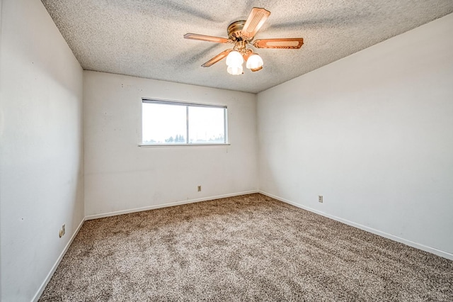 11016 E S Ave, Selma, CA 93662 - unfurnished room with a textured ceiling, carpet, and a ceiling fan