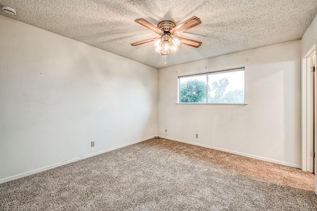 11016 E S Ave, Selma, CA 93662 - unfurnished room featuring carpet flooring, ceiling fan, a textured ceiling, and a smoke detector