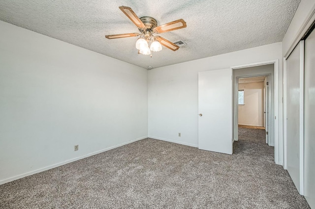 11016 E S Ave, Selma, CA 93662 - carpeted empty room featuring a textured ceiling and ceiling fan