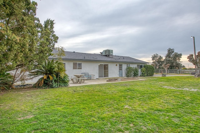 11016 E S Ave, Selma, CA 93662 - rear view of property featuring a patio area and stucco siding
