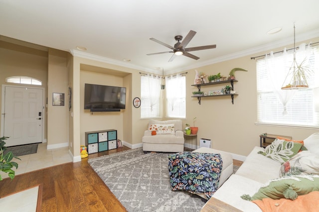 4001 W Fig Tree Ln, Fresno, CA 93722 - living room featuring ceiling fan, crown molding, and wood finished floors