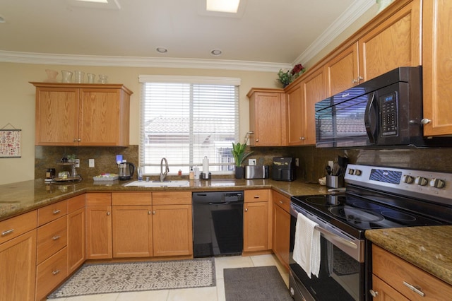 4001 W Fig Tree Ln, Fresno, CA 93722 - kitchen with black appliances, crown molding, backsplash, stone countertops, and light tile patterned floors
