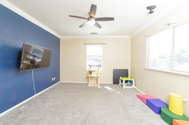 4001 W Fig Tree Ln, Fresno, CA 93722 - recreation room with crown molding, ceiling fan, and carpet flooring