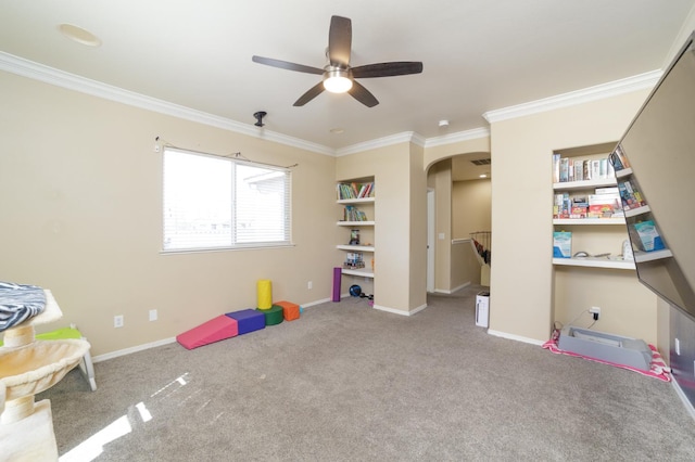 4001 W Fig Tree Ln, Fresno, CA 93722 - game room with arched walkways, ceiling fan, ornamental molding, and carpet flooring