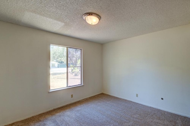 41151 Fig Grove Cir, Madera, CA 93636 - spare room with carpet and a textured ceiling