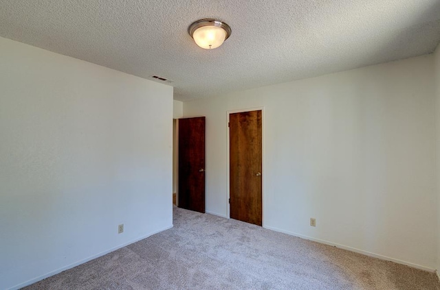 41151 Fig Grove Cir, Madera, CA 93636 - spare room featuring carpet and a textured ceiling