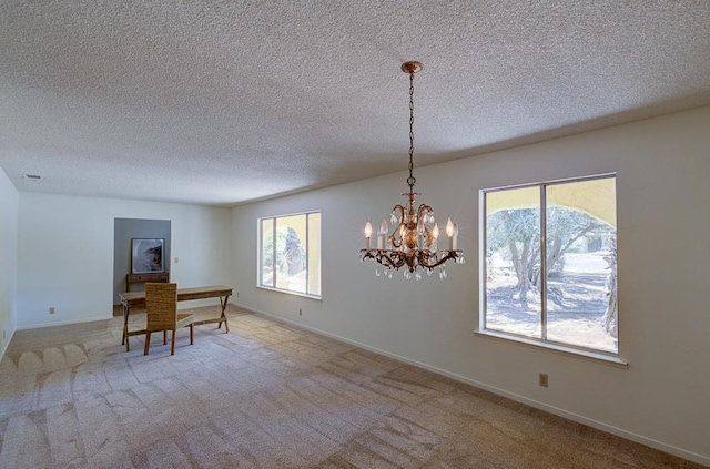 41151 Fig Grove Cir, Madera, CA 93636 - carpeted dining area with a chandelier and a textured ceiling