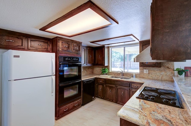 41151 Fig Grove Cir, Madera, CA 93636 - kitchen with black appliances, light countertops, decorative backsplash, and a textured ceiling