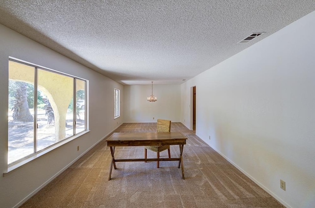 41151 Fig Grove Cir, Madera, CA 93636 - carpeted dining room with a chandelier and a textured ceiling
